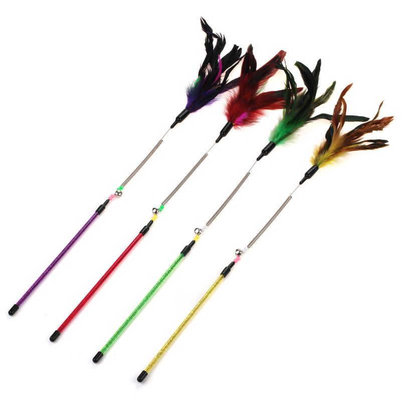 Mávátko s peřím na pružince